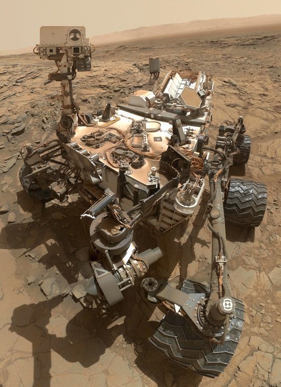 A high-tech Mars rover standing on red, dusty terrain under a pale sky — symbolizing precision, reliability, and the power of autonomous systems, much like a well-engineered streaming platform.